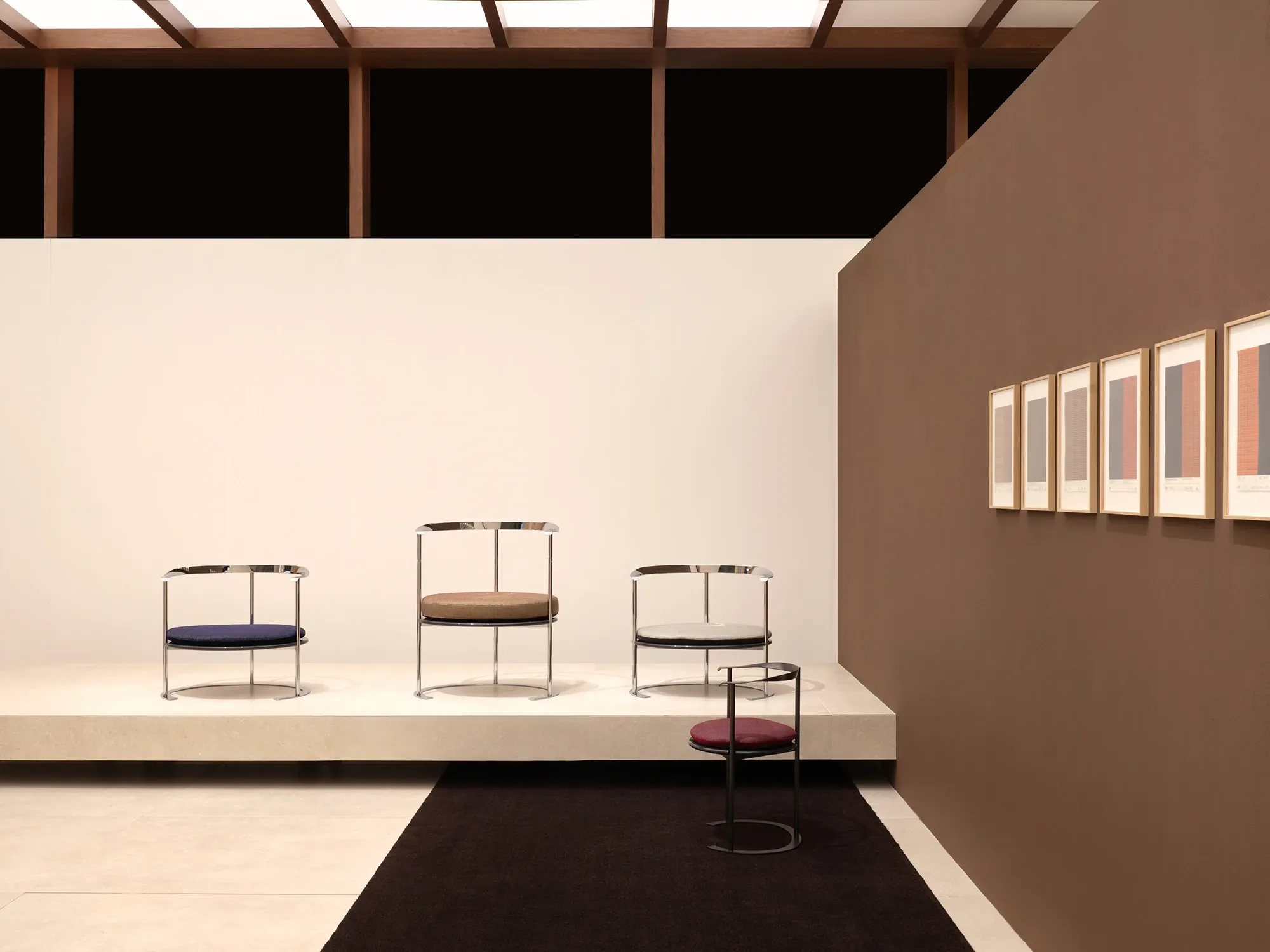 Haus Nuller textile cushions for the Catilina chair shown on a stand by Formafantasma.