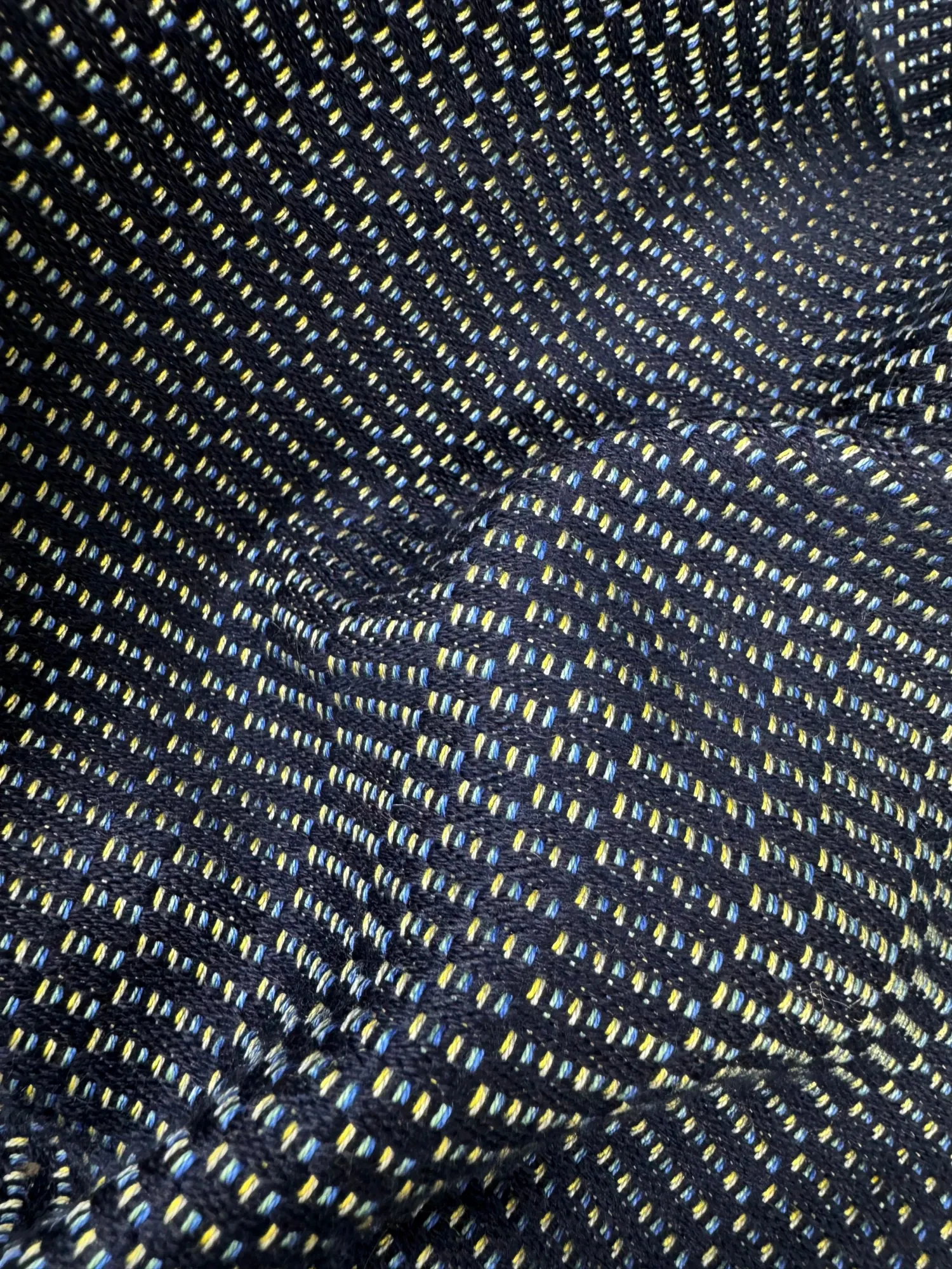Detail of woven Haus Nuller textile for the Catilina chair cushion.